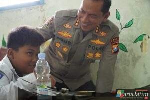Polda Jatim Dukung Asta Cita Salurkan Ribuan Porsi Makanan Bergizi Gratis Untuk Pelajar