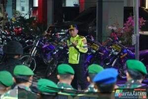 Suran Agung : Ratusan Polisi Kawal Ketat 2.400 Warga PSHWTM dari Ponorogo ke Madiun