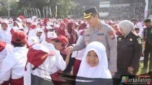 Kapolres Nganjuk Hadiri Apel Akbar KNC 2025, Ribuan Pelajar Nganjuk Terima Beasiswa