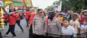 Polsek Krian Kawal Meriahnya Kirab Budaya Kong Tek Cun Ong