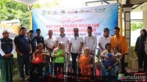 Polres Nganjuk dan PWI Satukan Langkah, Salurkan Kursi Roda dan Sembako Peringati HPN 2026