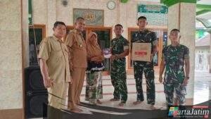 Momentum Ramadhan, Satgas TMMD ke-127 Bagikan Al Quran ke 13 Rumah Ibadah di Desa Gadungan
